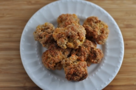 Sausage Cheese Balls on a white plate; serve with Chinese firecrackers