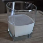Oat milk in a glass.