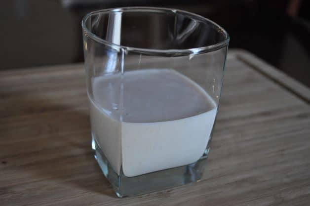 Oat milk in a glass.