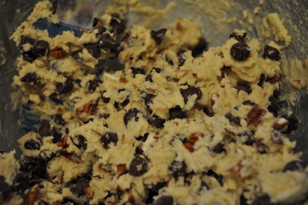 Cookie dough with chocolate chips and nuts.