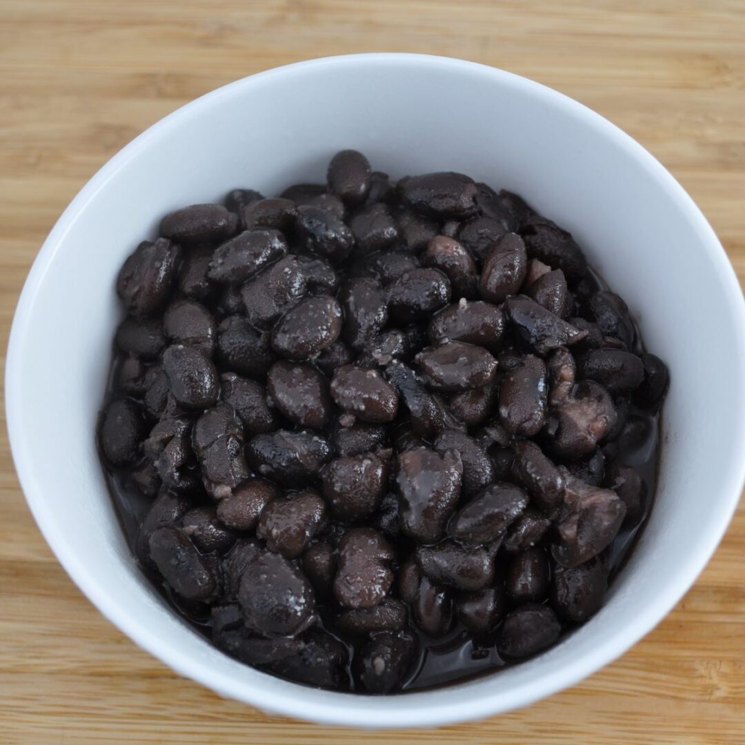 Canned black beans heated in the oven or on the stove and seasoned with a few spices for an amazing side dish.