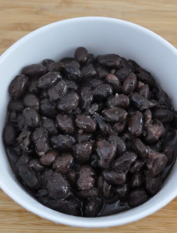 Canned black beans heated in the oven or on the stove and seasoned with a few spices for an amazing side dish.
