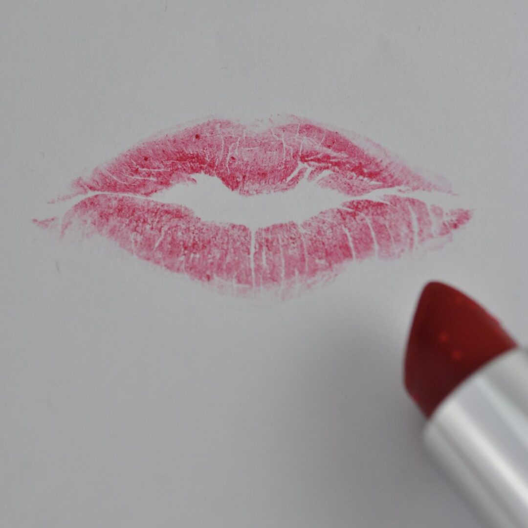 Plump lips print of lips and lipstick.