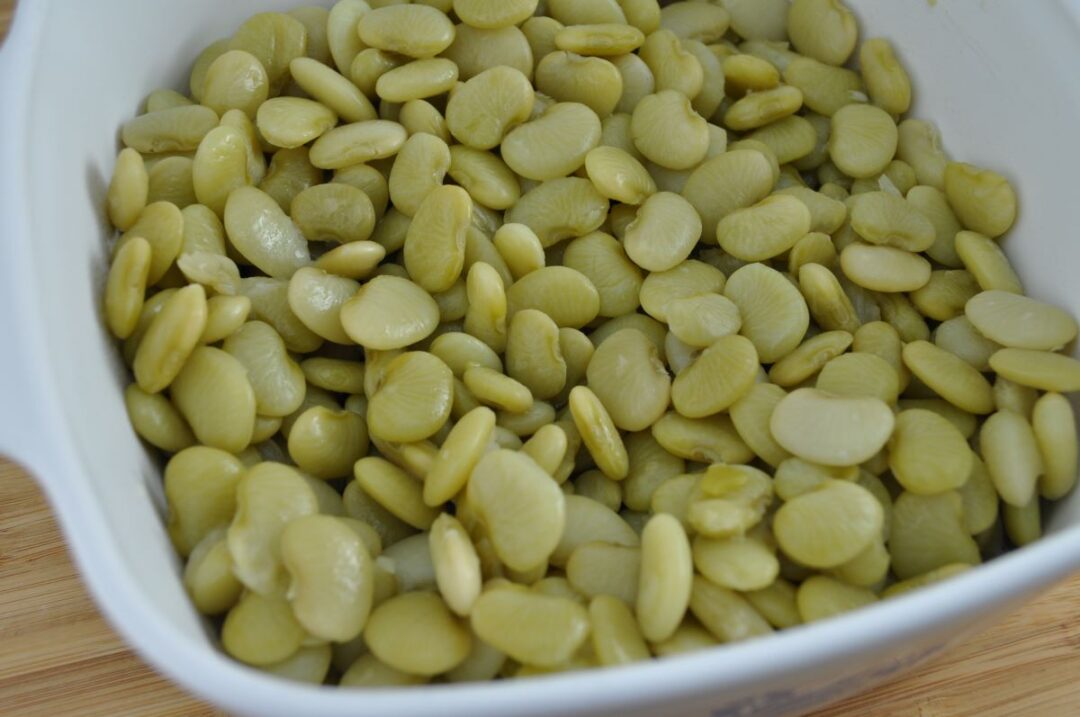 Lima beans in a casserole dish.