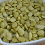 Lima beans in a casserole dish.