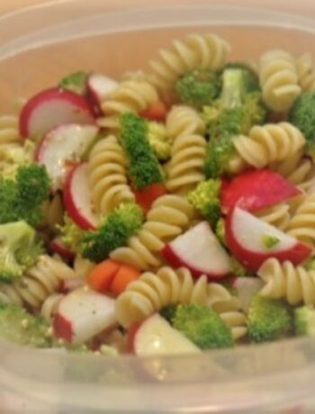 Easy pasta salad with Italian dressing in a bowl ready to serve cold.